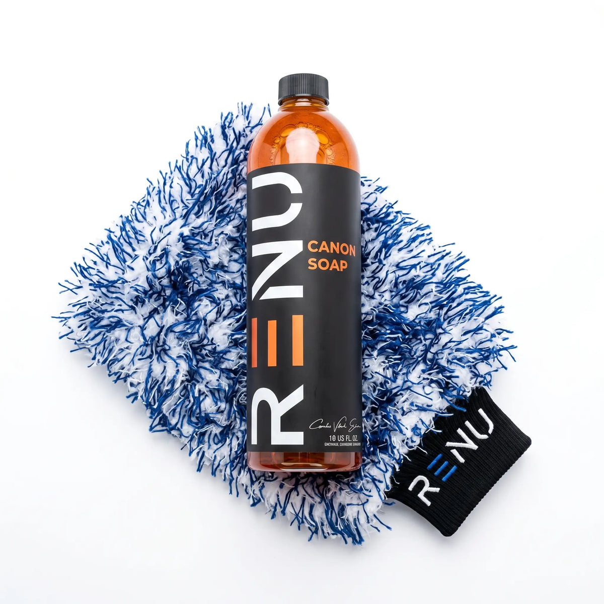 Bottle of Renu Canon Soap with a blue scrubber on a white background