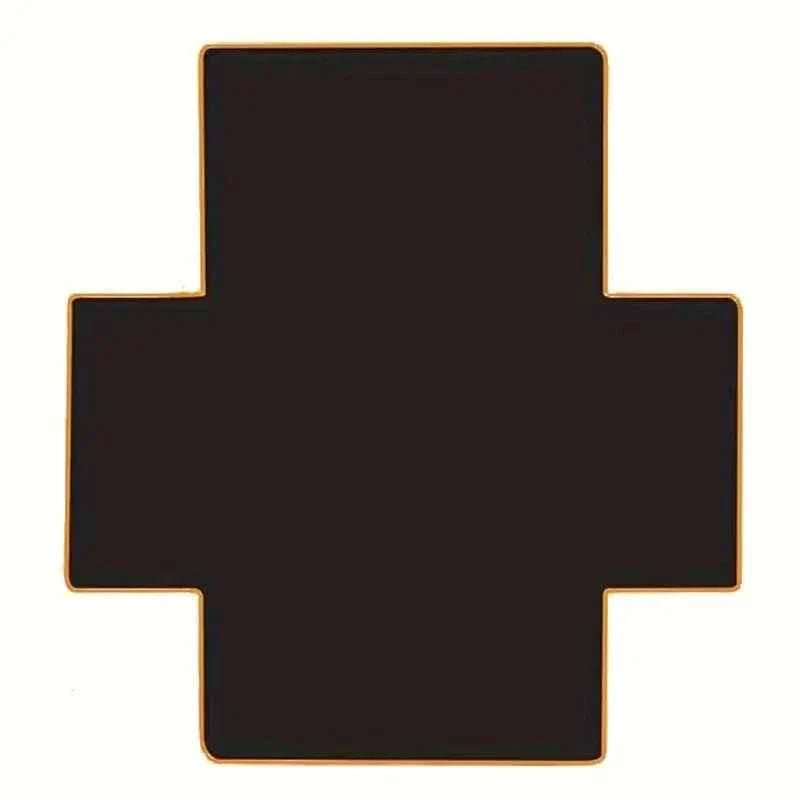 Black cross-shaped cargo liner spread out with gold border on a white background