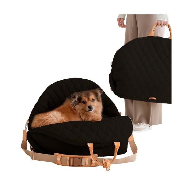 Dog in the black quilted 3-in-1 pet carrier bed