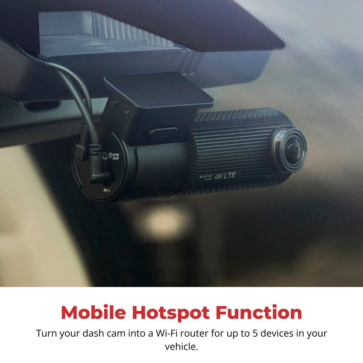 BlackVue DR970X LTE Plus II mounted on a windshield with its power cable