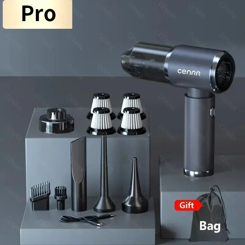 Hand held vacuum set with multiple attachments and a gift bag on a gray background