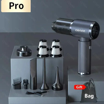 Hand held vacuum set with multiple attachments and a gift bag on a gray background
