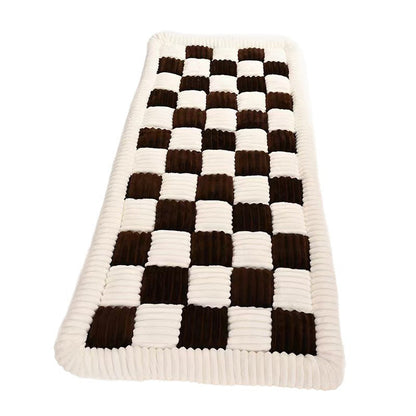 Long brown and cream checkered plush mat in the 60 x 135 cm runner size