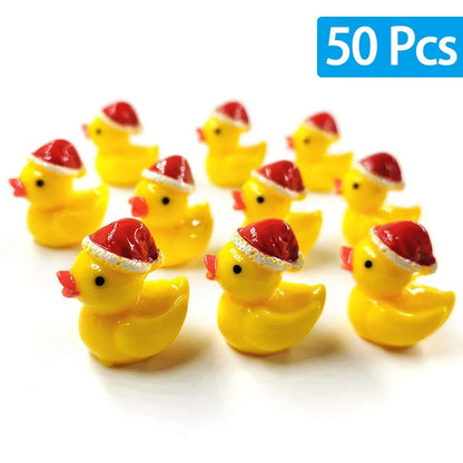 10 yellow rubber ducks wearing Santa hats on a white background with '50 Pcs' text.