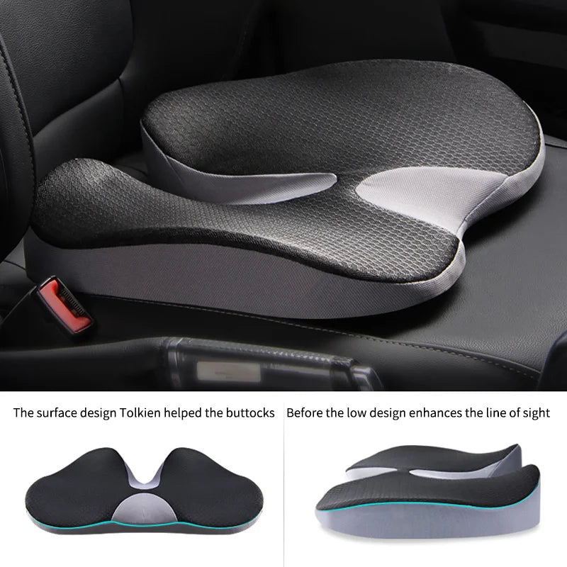 A contoured ergonomic support pillow in black with a gray center and a thin teal accent line along the bottom edge, shown on a clean white background.