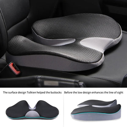 A contoured ergonomic support pillow in black with a gray center and a thin teal accent line along the bottom edge, shown on a clean white background.