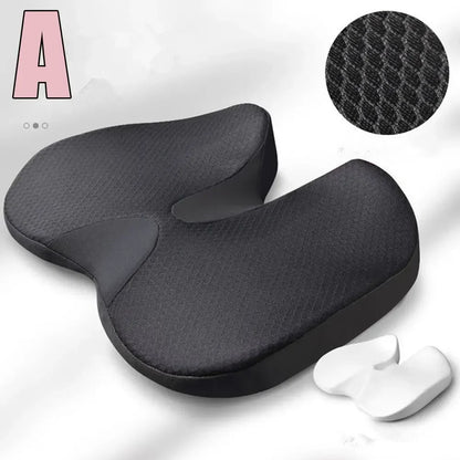 Black seat cushion with textured surface and small white object on a light gray background