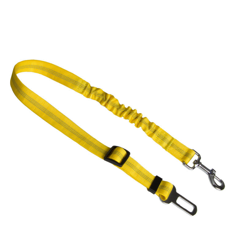 Elastic dog car seat belt tether in yellow with bungee section, snap hook and buckle clip