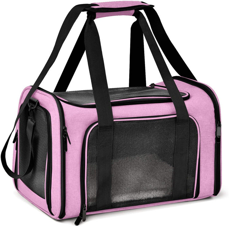 Pink soft-sided pet carrier with mesh windows