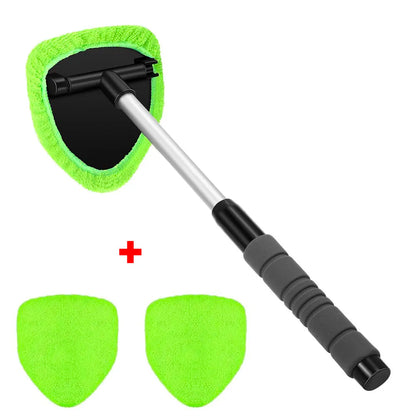 Car window cleaning tool with green microfiber pads on a white background