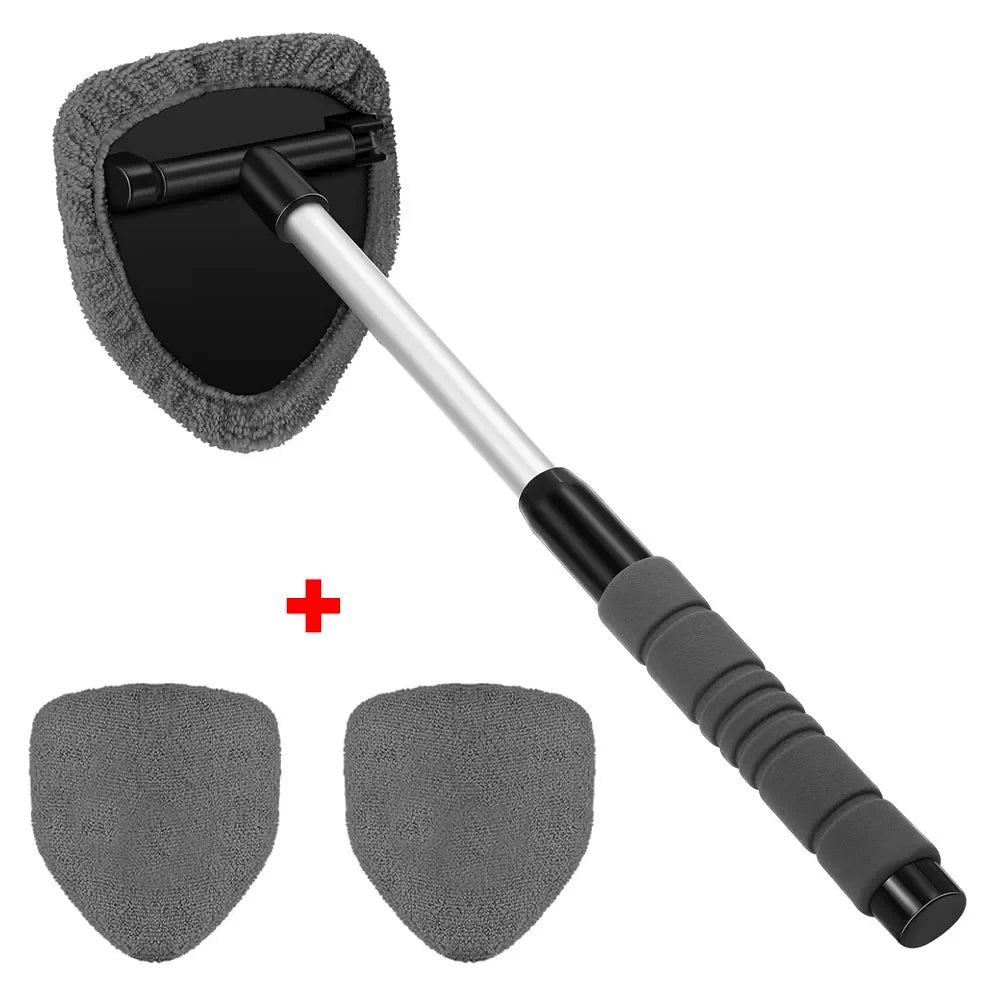 Car window cleaning tool with extendable handle and two additional cleaning pads on a white background