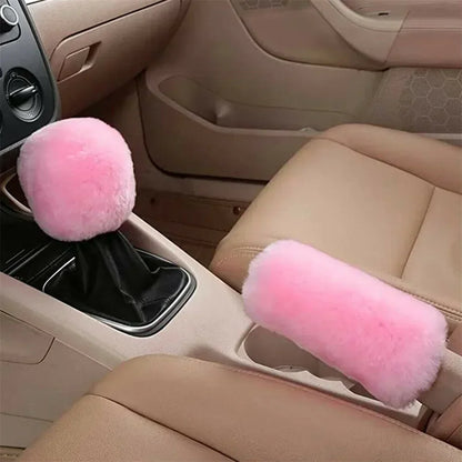 Car interior with pink gear shift and handbrake cover