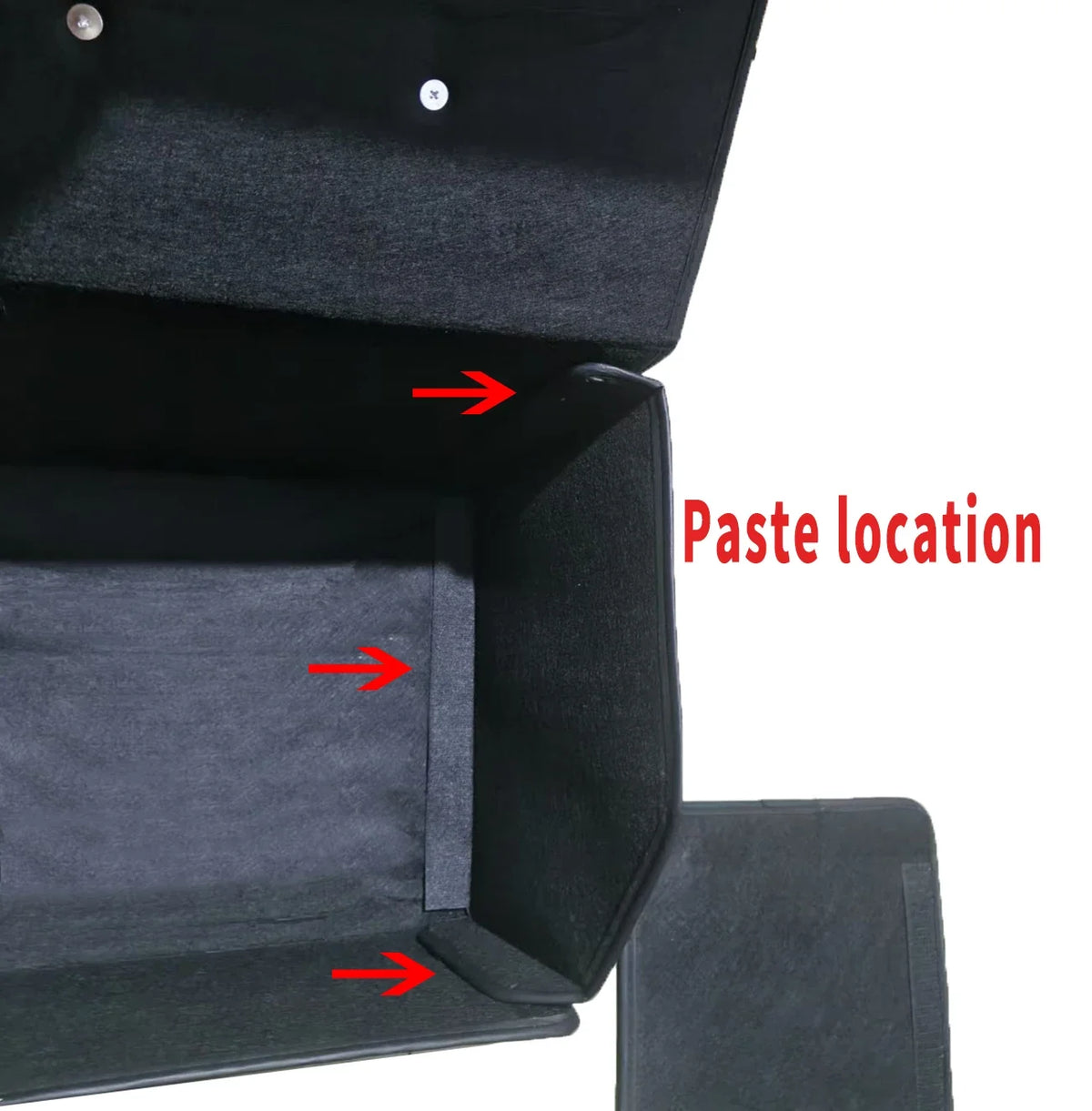 Dark gray car mat with red arrows and 'Paste location' text on a white background