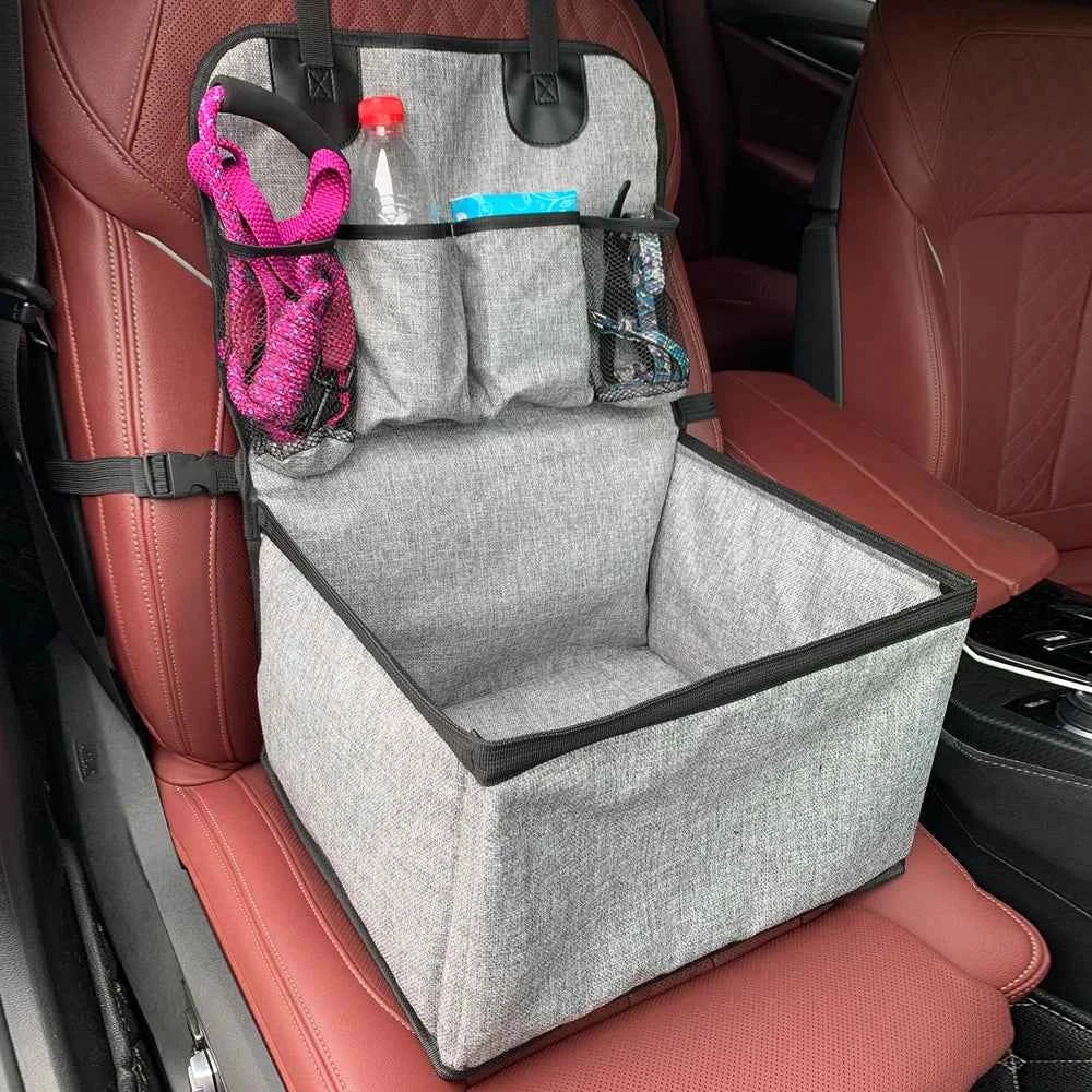 Gray car storage box with organizer on a red car seat