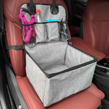 Gray car storage box with organizer on a red car seat