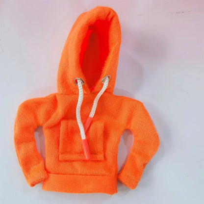 Orange hoodie with a white drawstring on a light gray background