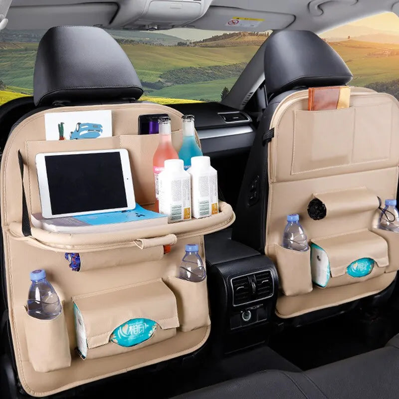 Car back seat organizer with tablet, bottles, and tissues in a vehicle interior.