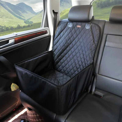 Black quilted front seat dog cover with raised sides installed on a passenger seat