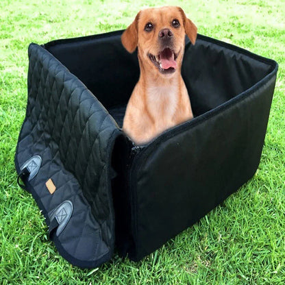 Dog standing inside the black quilted seat cover with sides raised