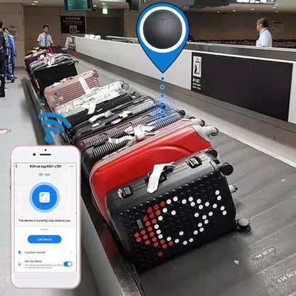 Baggage claim area with suitcases and a smartphone displaying a location tracking app.