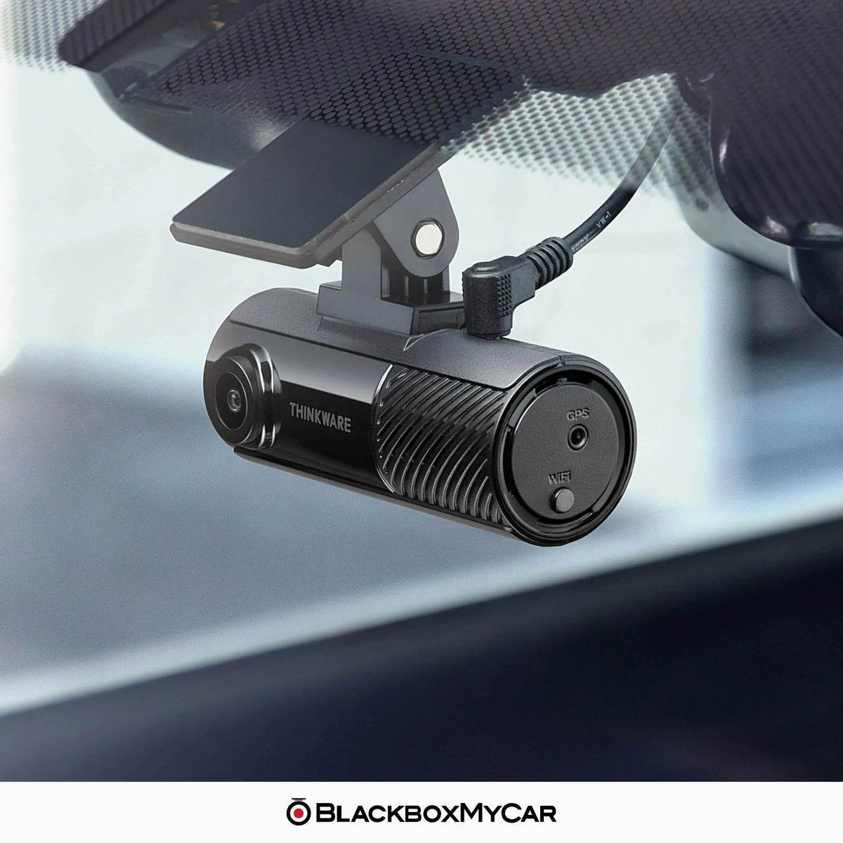 Car dashboard camera mounted inside a vehicle, with 'BlackboxMyCar' branding.