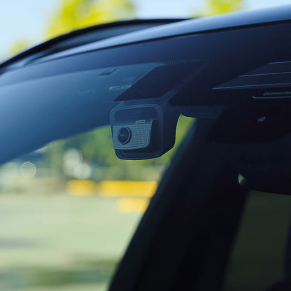 Car rearview camera mounted on a vehicle's windshield