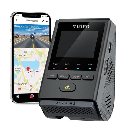 VIOFO A119 Mini 2 dash cam beside a phone displaying video playback and a route map