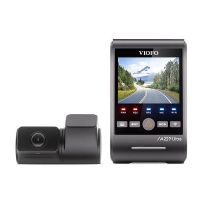 Car dashboard camera system with display and lens on a white background